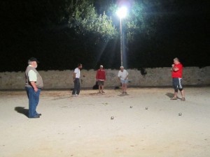 Volunteers join a game of Pétanque in Brossac